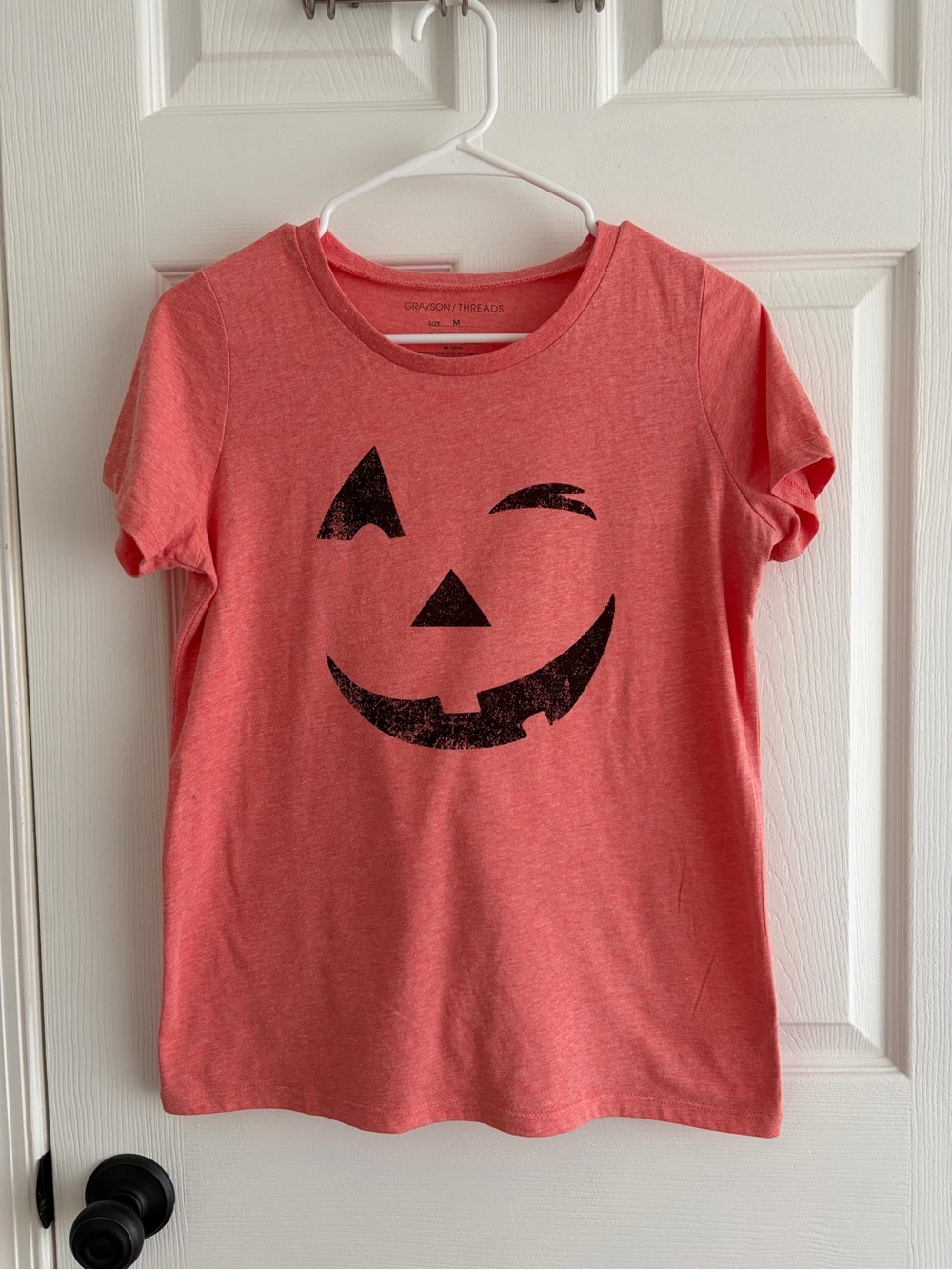 Grayson Threads Coral Winking Jack-O'-Lantern Short Sleeve Tee